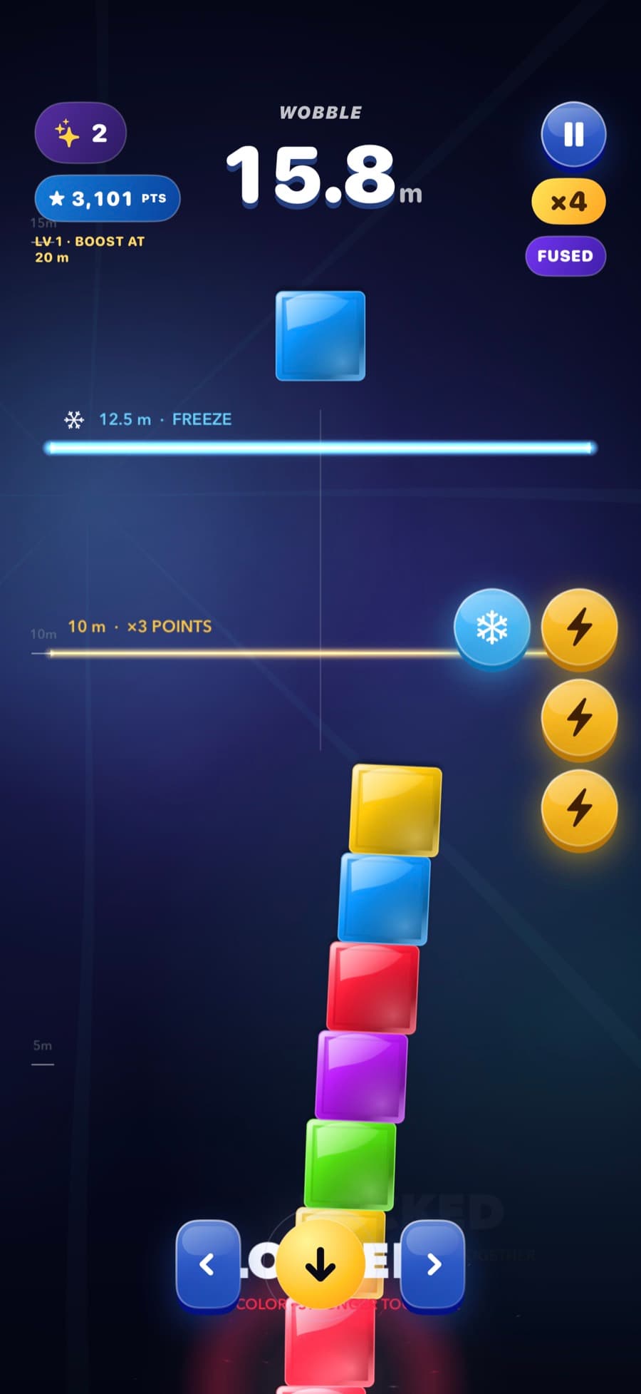 Same-color Wobble pieces locking together in a glowing tower